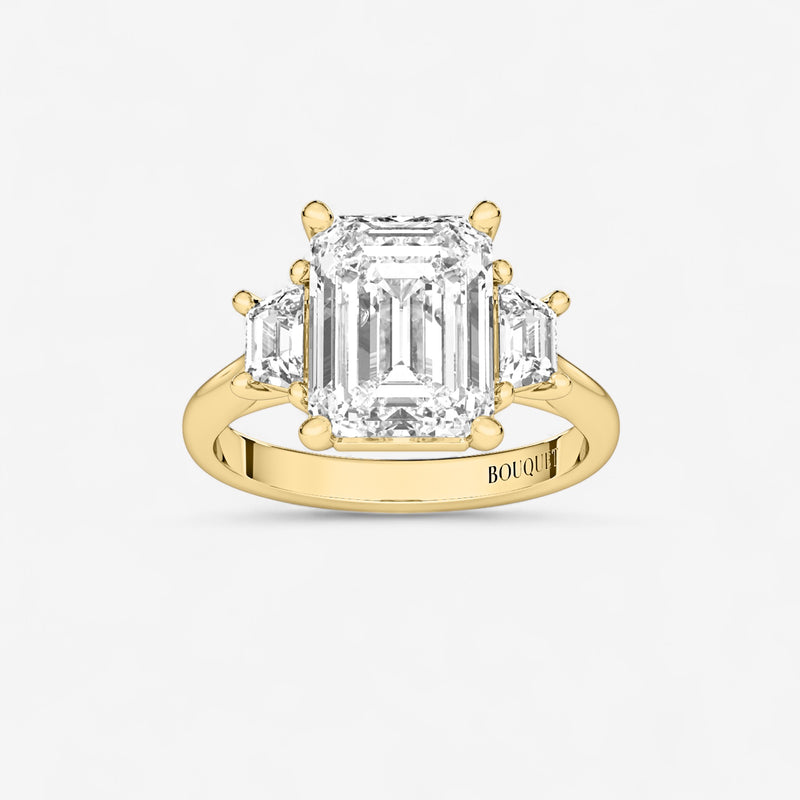 Emerald with Trapezoid Side Stones Engagement Ring