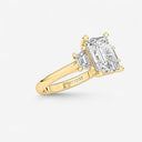 Emerald with Trapezoid Side Stones Engagement Ring