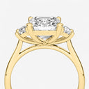 Emerald with Trapezoid Side Stones Engagement Ring