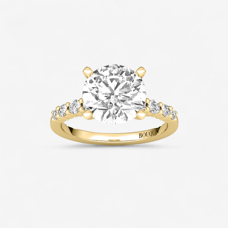 Round Graduated Side Stone Engagement Ring